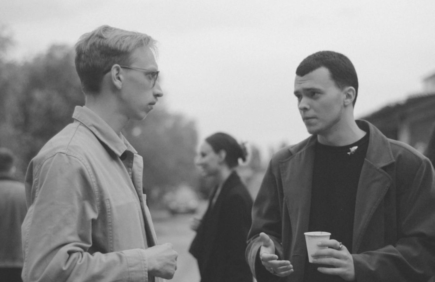 Modern workspace setup showing laptop displaying financial analysis software with organized desk environment